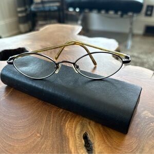 modoVintage Sleek Black and Gold frames with oval Design with RX lenses